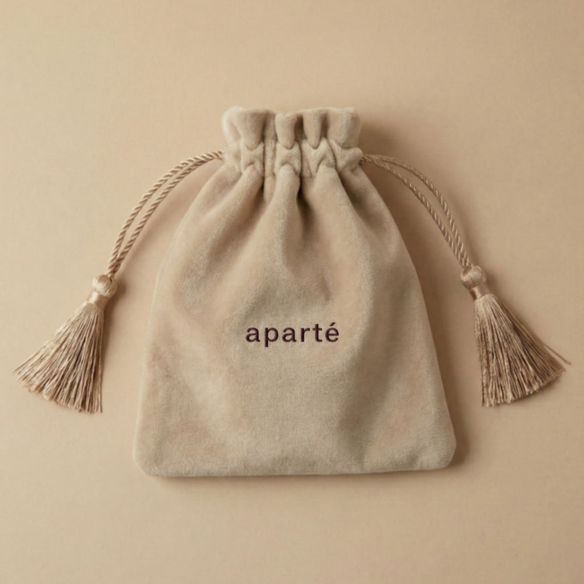 La pochette de rangement en velours aparté